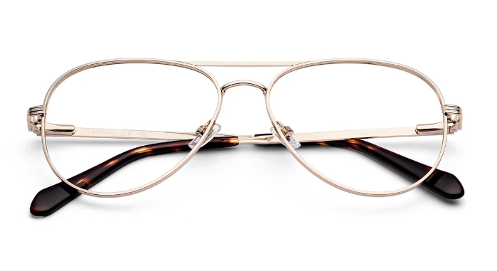 Detailed angled view of retro optical frames in a polished gold metal finish